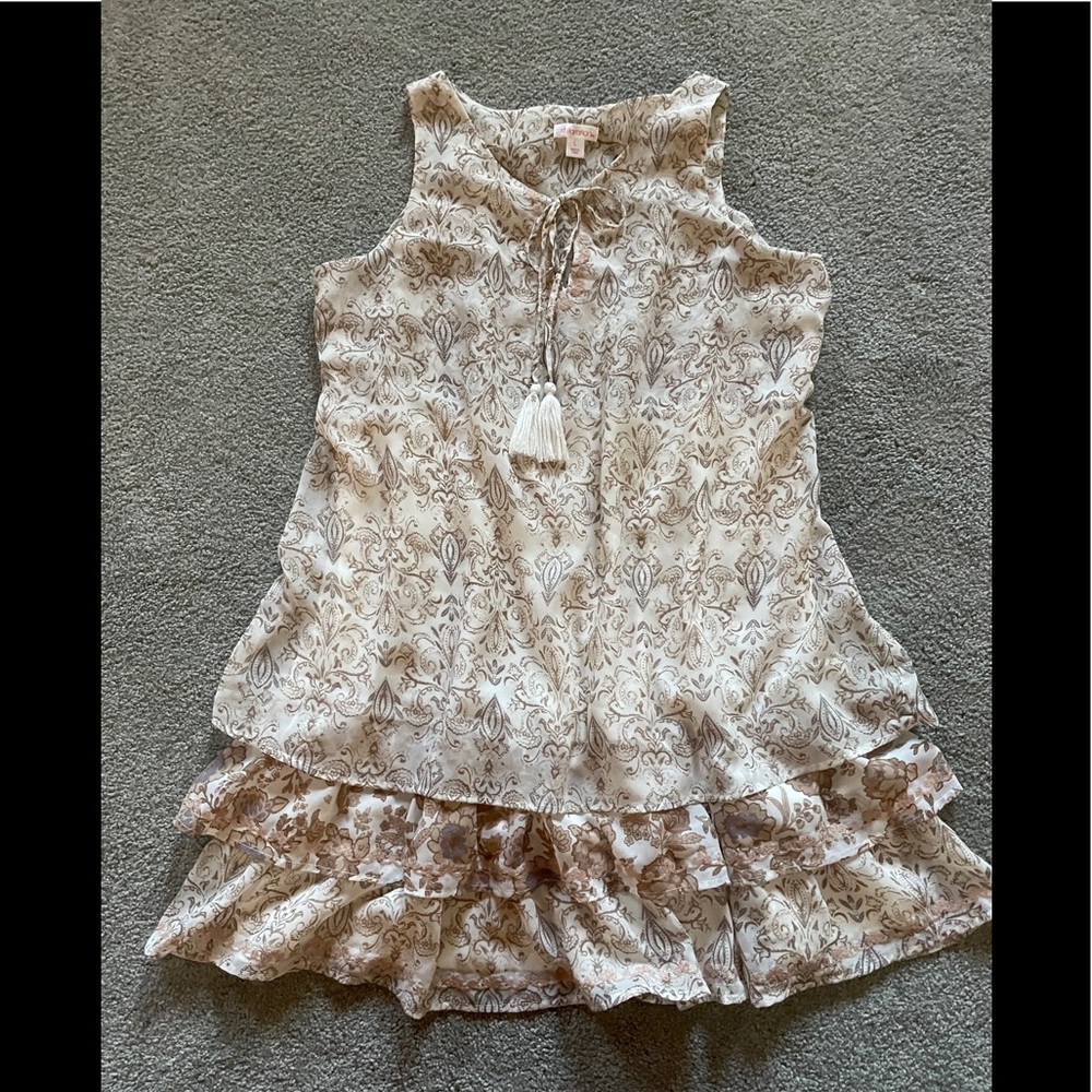 Sleeveless tunic / dress with layered hem